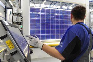A worker at SolarWorld's factory in Freiburg, Germany. Photo Credit: SolarWorld AG