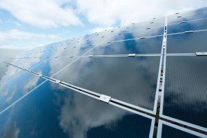 First Solar thin-film solar photovoltaic modules in a ground-mounted solar power plant. Photo: Business Wire