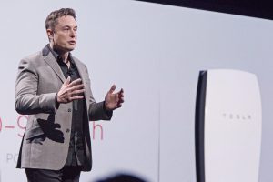 Elon Musk, co-founder and chief executive officer of Tesla Motors Inc., speaks during the unveiling of the company's "Powerwall' at an event in Hawthorne, California, U.S., on Thursday, April 30, 2015. Musk unveiled a suite of batteries to store electricity for homes, businesses and utilities, saying a greener power grid furthers the company's mission to provide pollution-free energy. Photographer: Tim Rue/Bloomberg via Getty Images